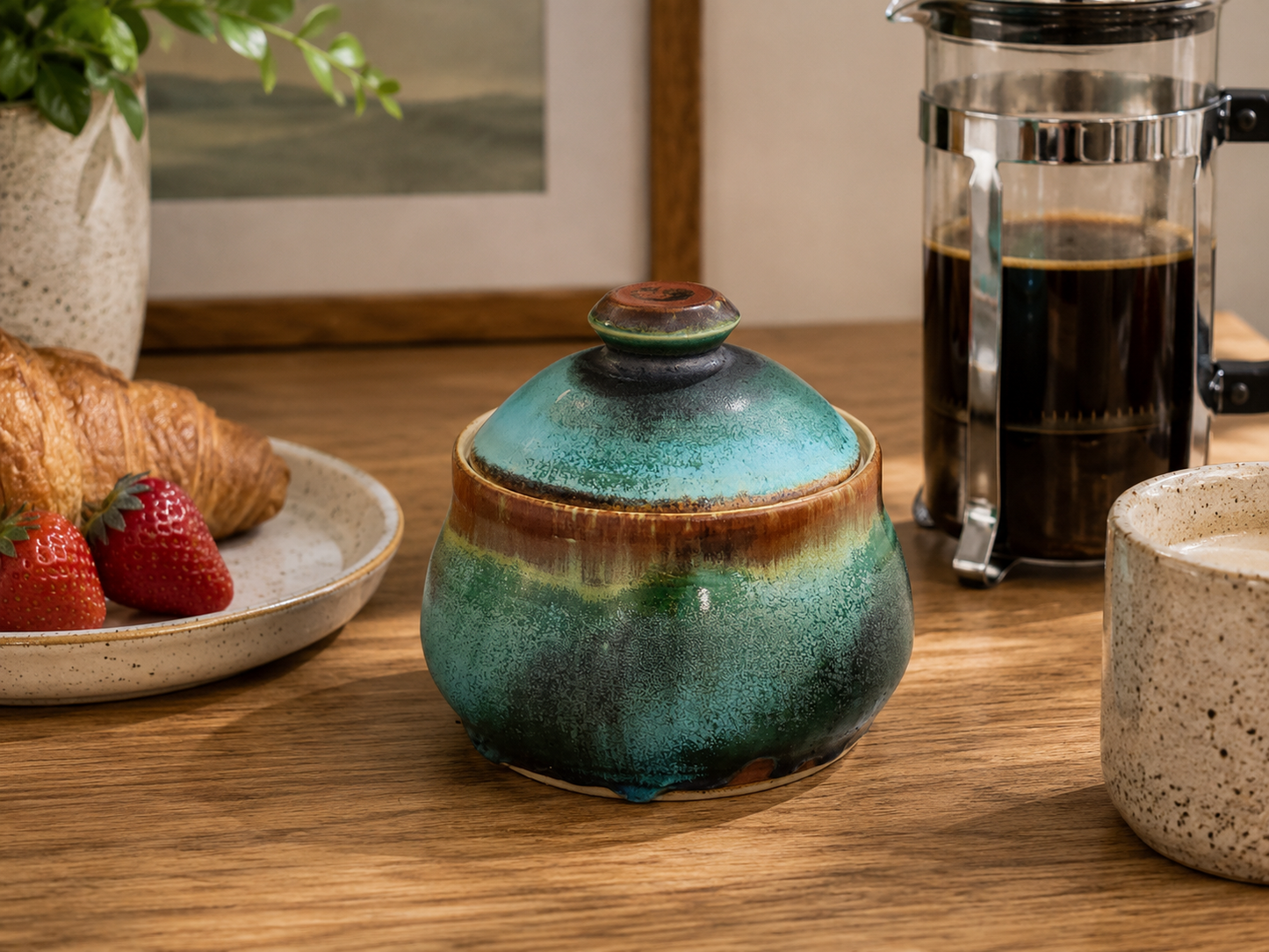 Handmade ceramic sugar bowl with lid from Bush Creek Earth Collection styled beside French press coffee