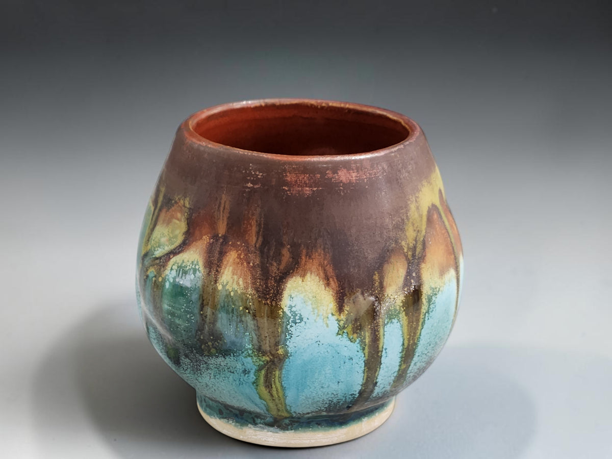 Rounded ceramic whisky sipper with turquoise speckled handmade glaze