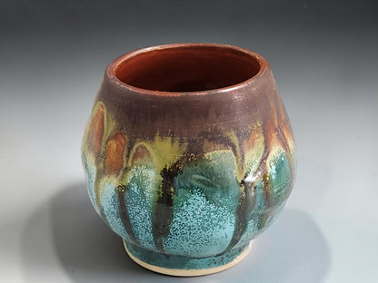 Small rounded ceramic cup for tea, whisky or sake