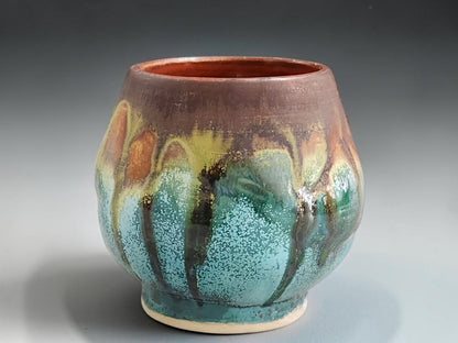 Handmade Melbourne pottery yunomi with organic multicoloured drips