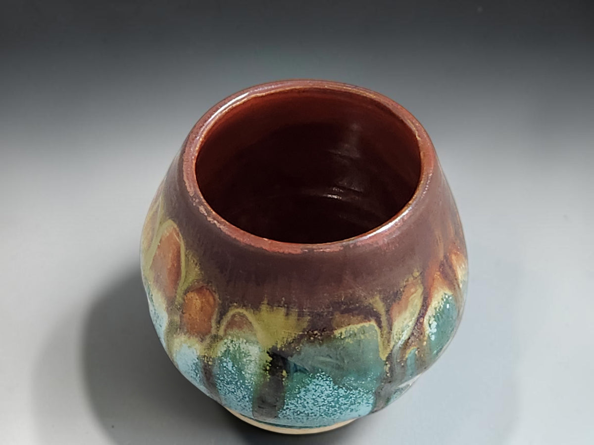 Rounded stoneware tea cup in earthy Bush Creek-inspired glaze