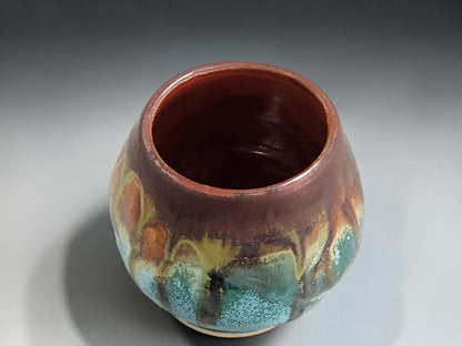 Rounded stoneware tea cup in earthy Bush Creek-inspired glaze