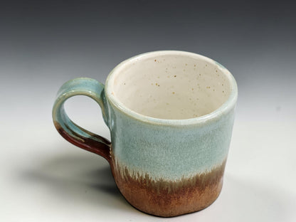 Australian stoneware espresso cup with green and earthy brown glaze