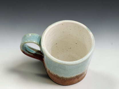 Small ceramic coffee cup measuring 6.5cm tall and 6.5cm wide
