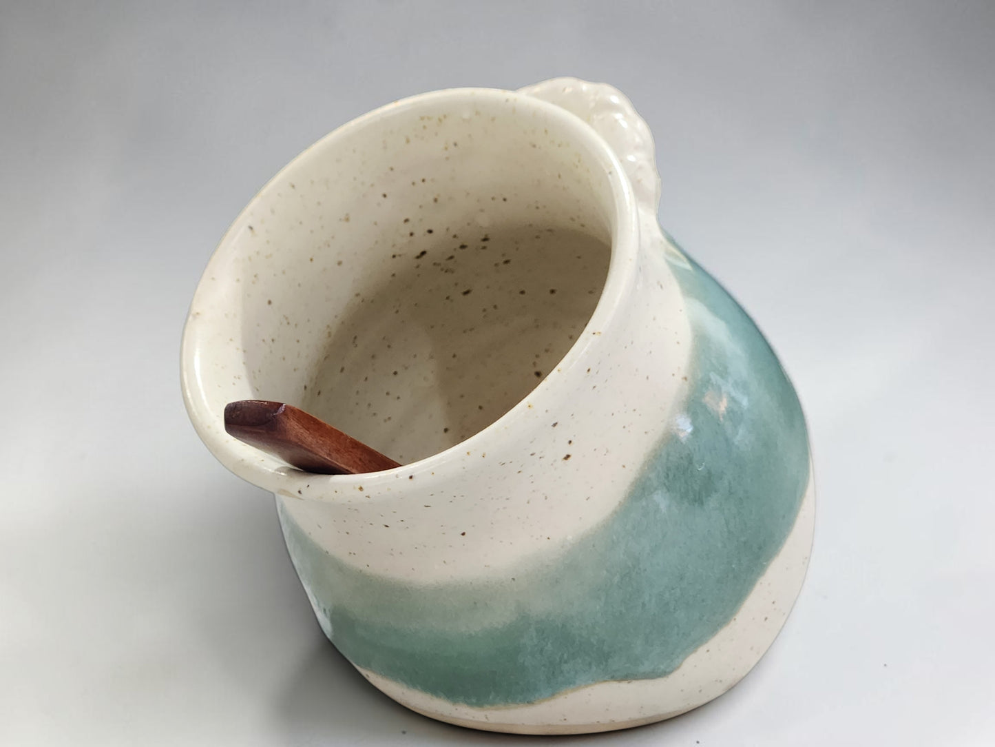 Decorative pottery salt pig for storing cooking salt beside the stove