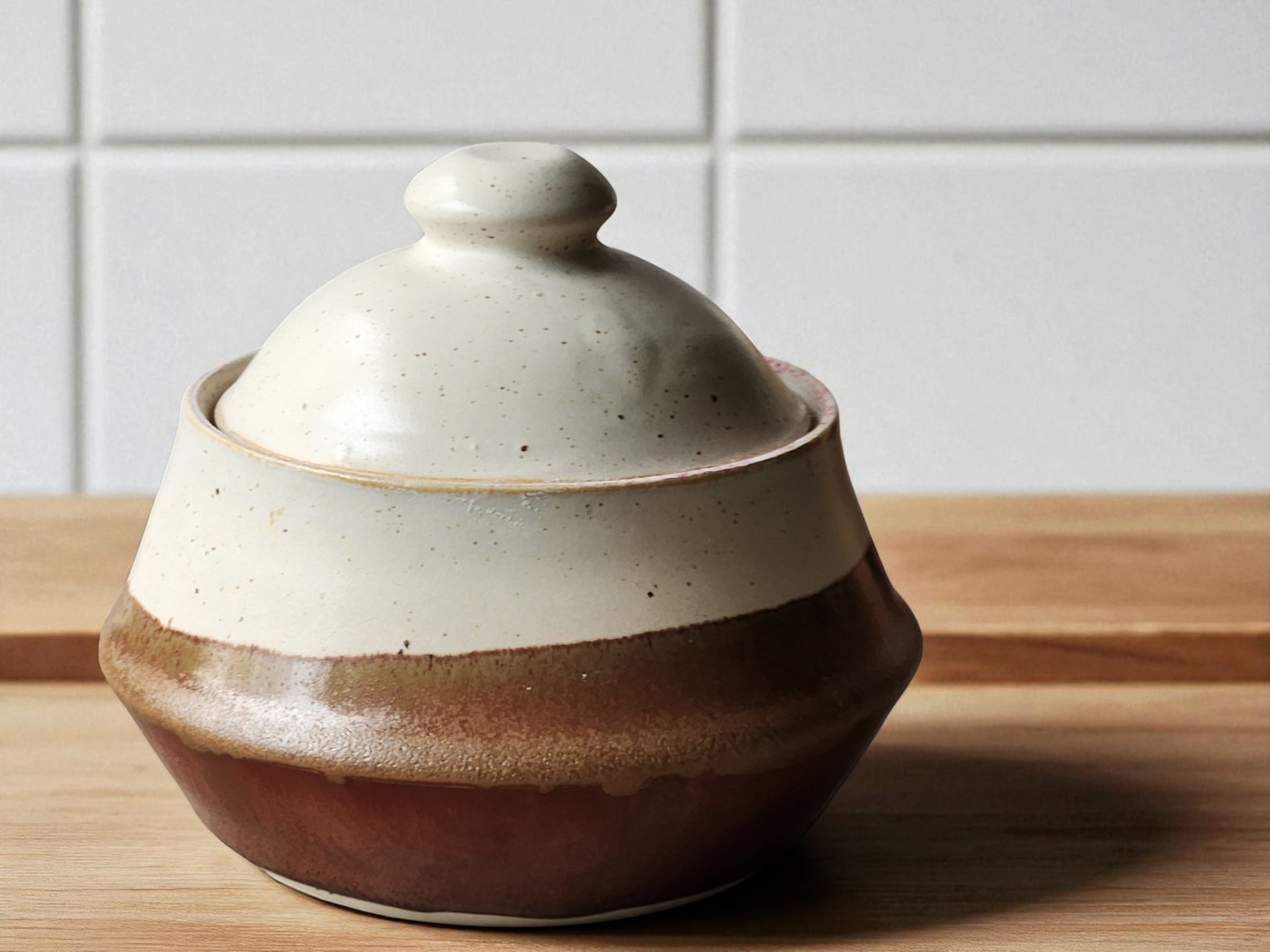 Handmade pottery sugar bowl with lid – speckled cream and red glaze