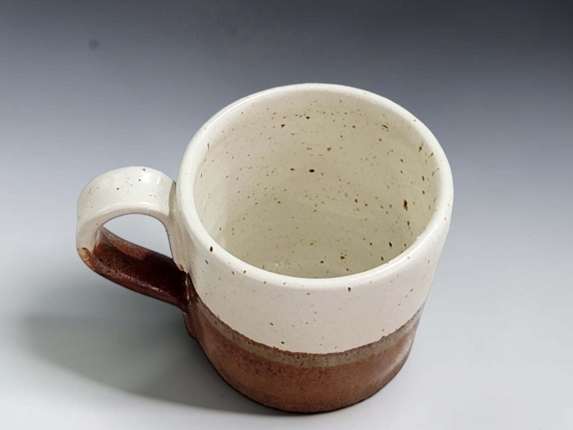 Small 100ml pottery coffee cup with a one-finger handle