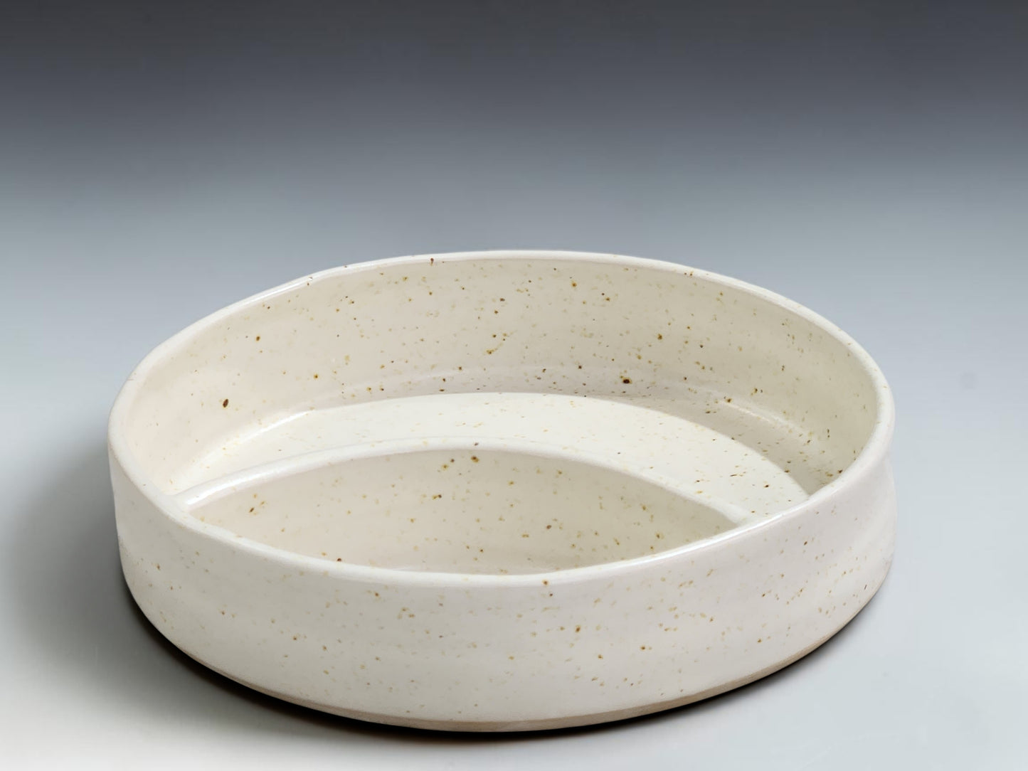 Australian handmade ceramic chip and dip bowl in neutral speckled cream glaze