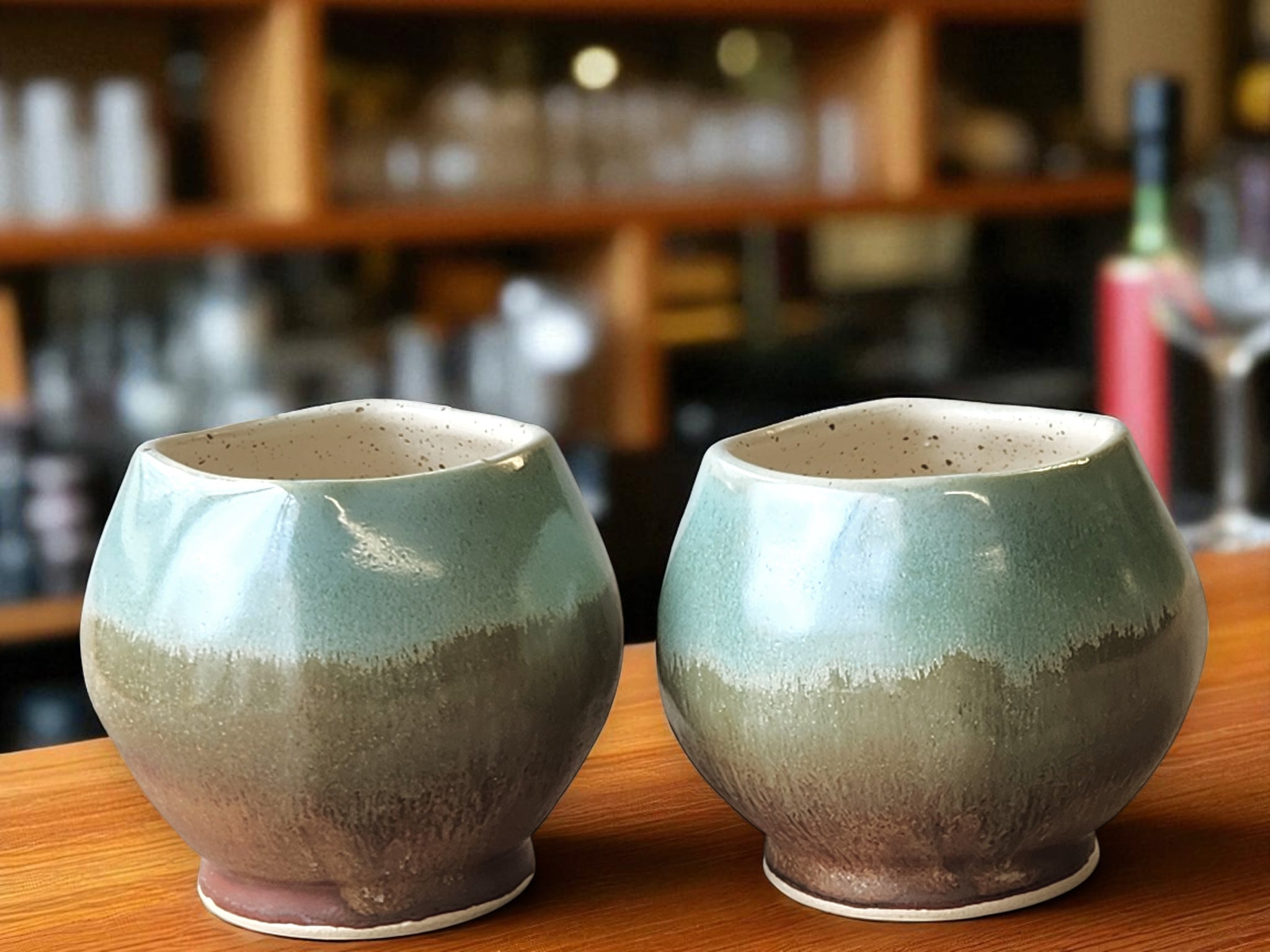Handmade ceramic teacup with speckled cream interior