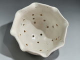 Speckled cream and green ceramic berry bowl for washing and serving fruit