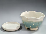 Handmade berry bowl with matching drip tray in cream and green glaze