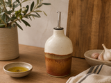Handmade ceramic oil bottle by Buxton Pottery, 400ml stoneware oil dispenser handcrafted in Melbourne with a cream and earthy brown glaze for stylish kitchen storage.