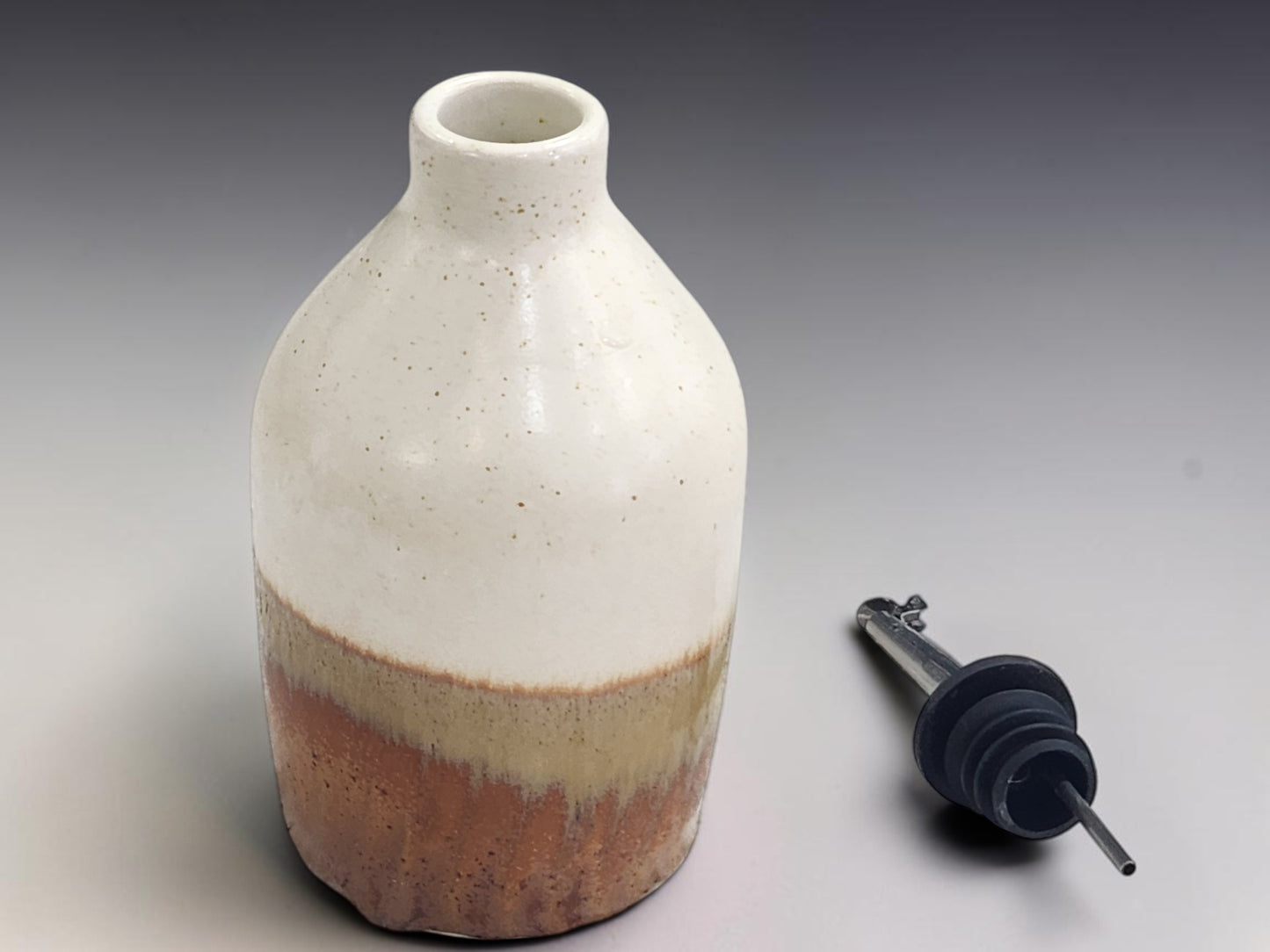 Pottery oil bottle 400ml in oatmeal and rust glaze with pourer, unique handmade kitchen gift Australia