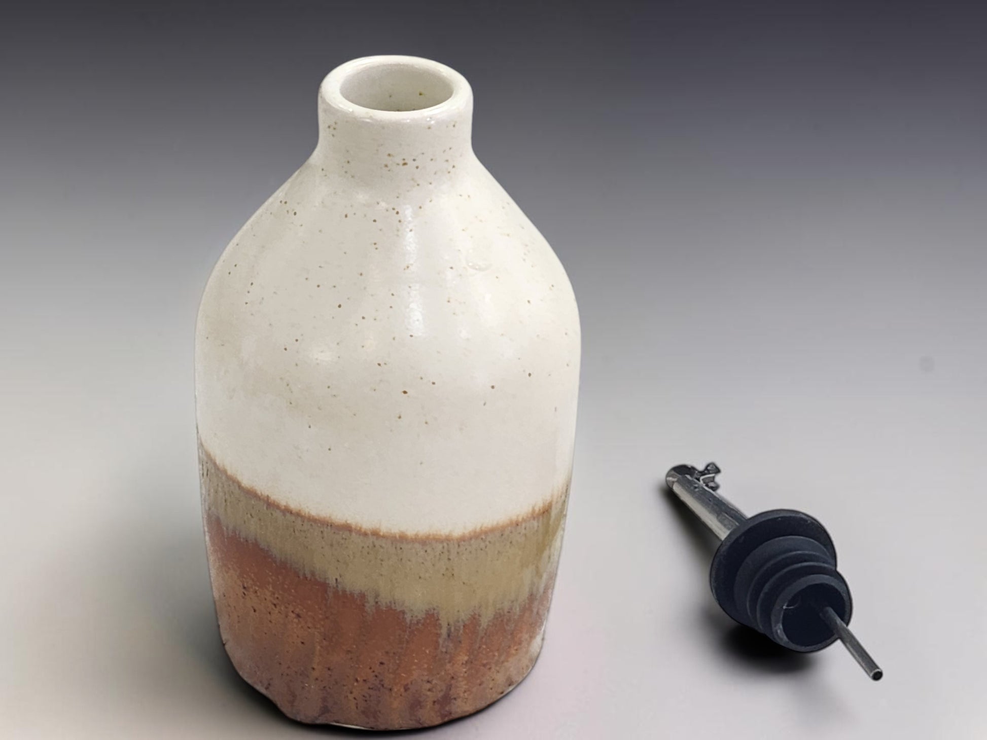 Pottery oil bottle 400ml in oatmeal and rust glaze with pourer, unique handmade kitchen gift Australia
