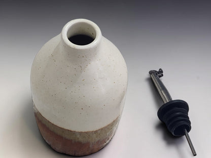 Handmade ceramic olive oil dispenser with earthy glaze finish, crafted in Melbourne Australia