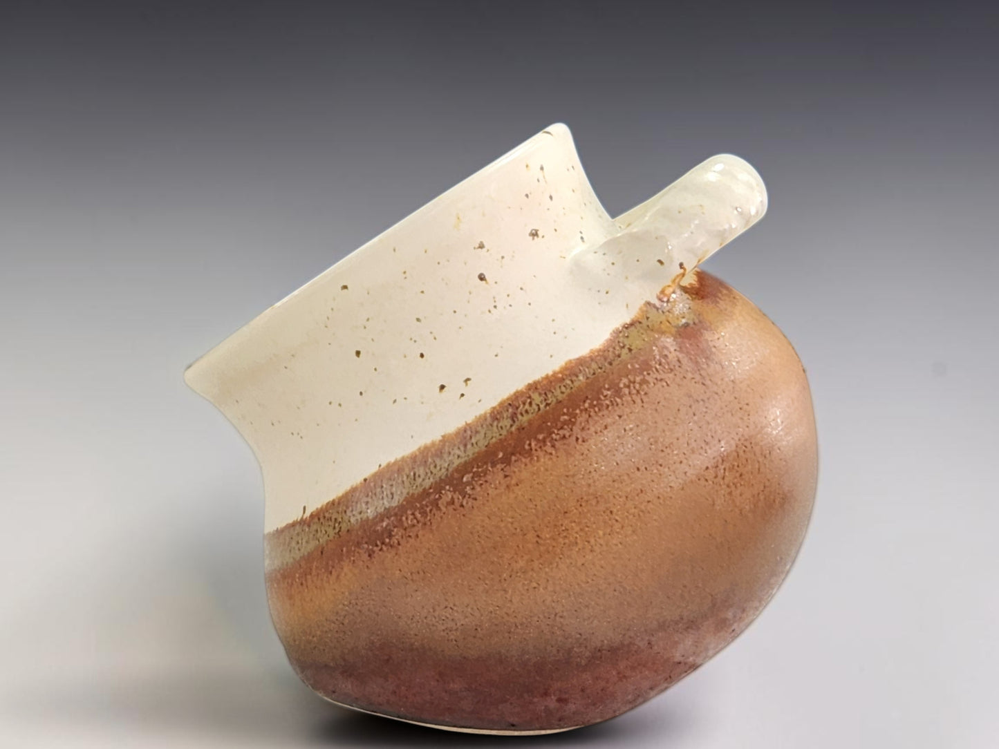 Handmade pottery salt container for kitchen use, food-safe ceramic with natural glaze variation