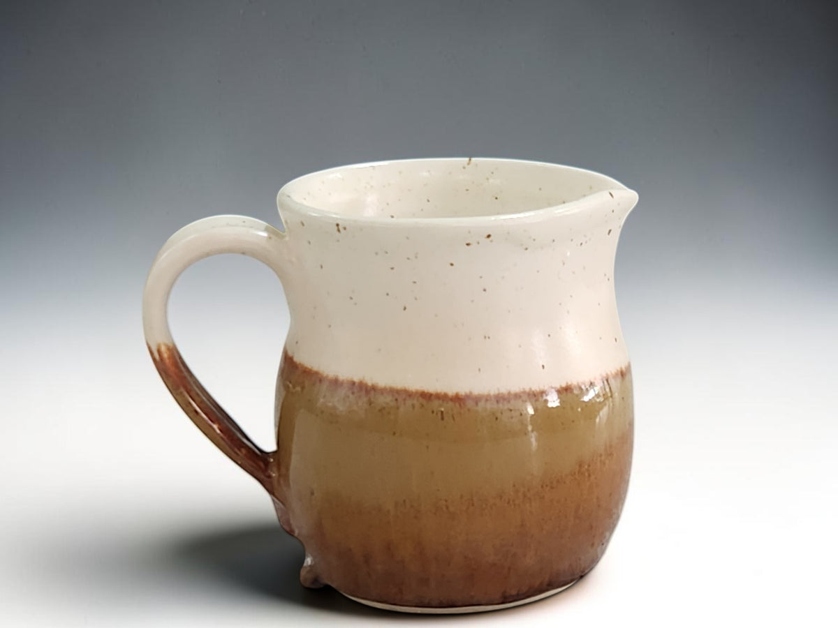 Handmade ceramic jug 300ml in speckled cream and brown glaze