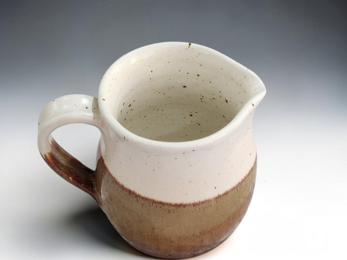 300ml ceramic jug with cream brown and caramel glaze