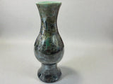 Tall handmade stoneware vase with crystalline glaze and sculptural form