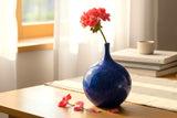 Handmade cobalt blue bottle vase with rounded belly and narrow neck