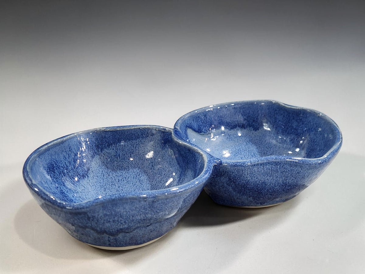 Blue ceramic entertaining bowl with two joined sections