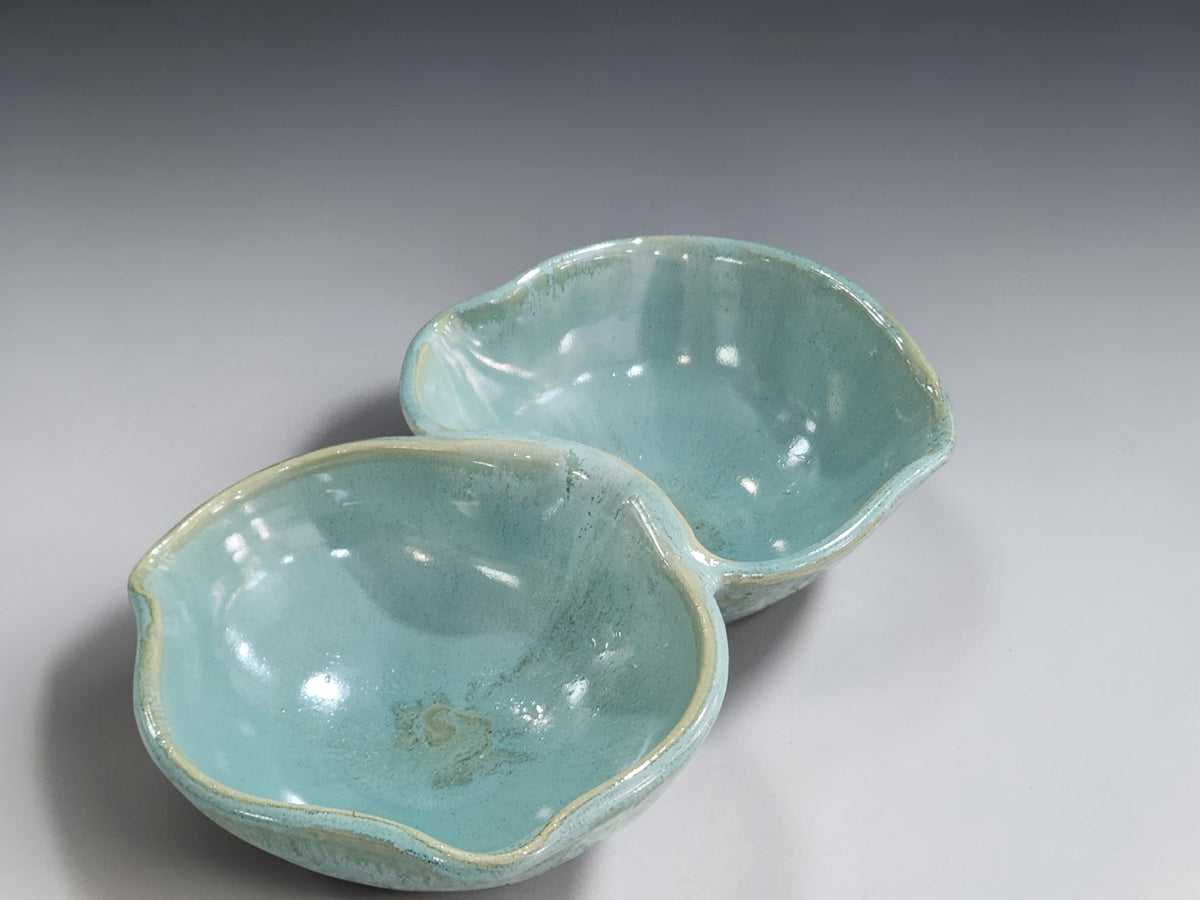 Two-section pottery snack bowl for serving nuts, olives or dips