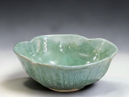 Australian handmade pottery serving bowl in glossy green glaze