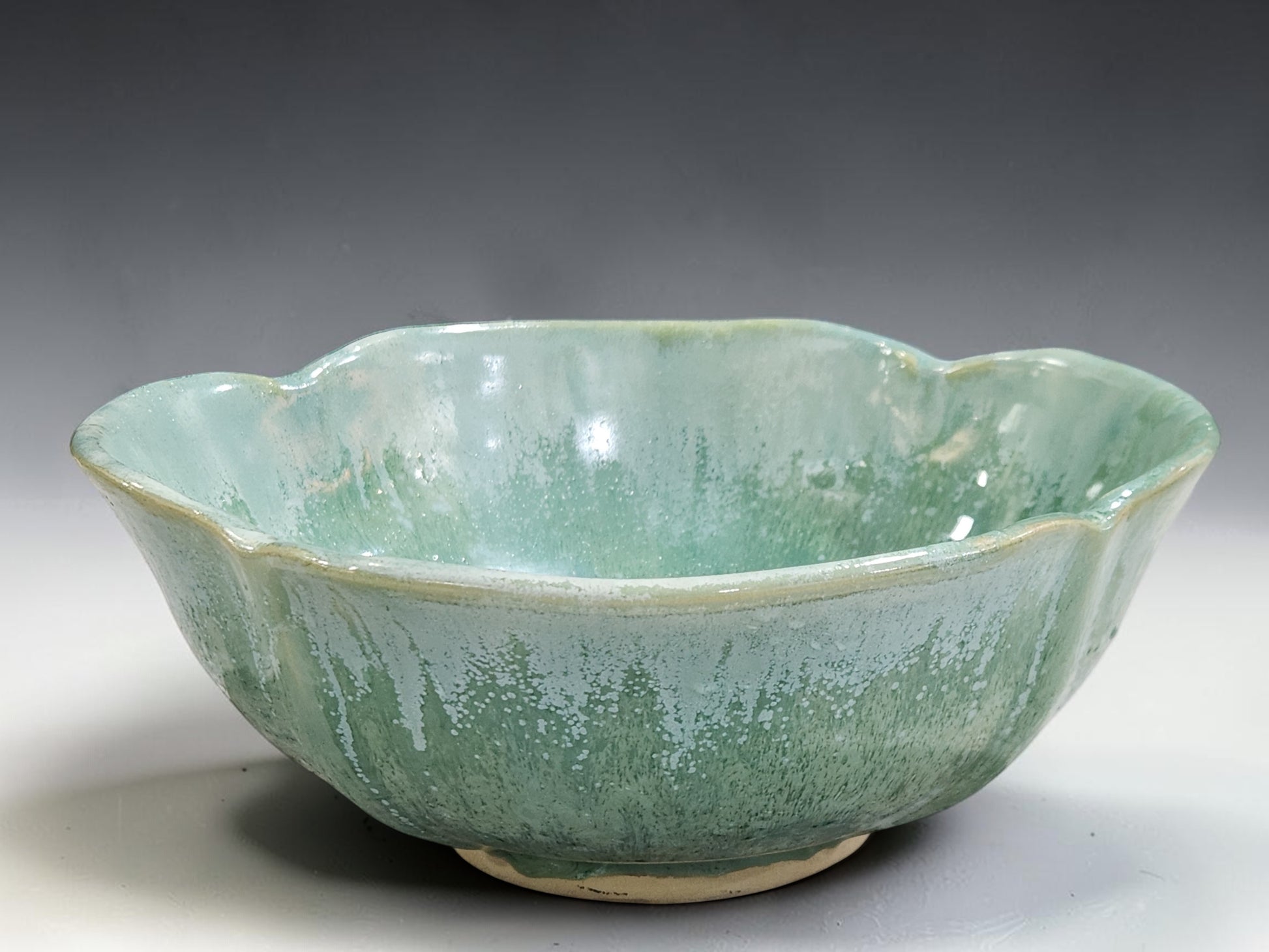 One-of-a-kind ceramic serving bowl with layered seafoam glaze