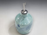 Australian handmade ceramic oil dispenser with bottle shape