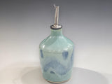 Handmade ceramic oil bottle for olive oil or dressing