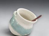 Handmade ceramic salt pig with aqua and cream glaze