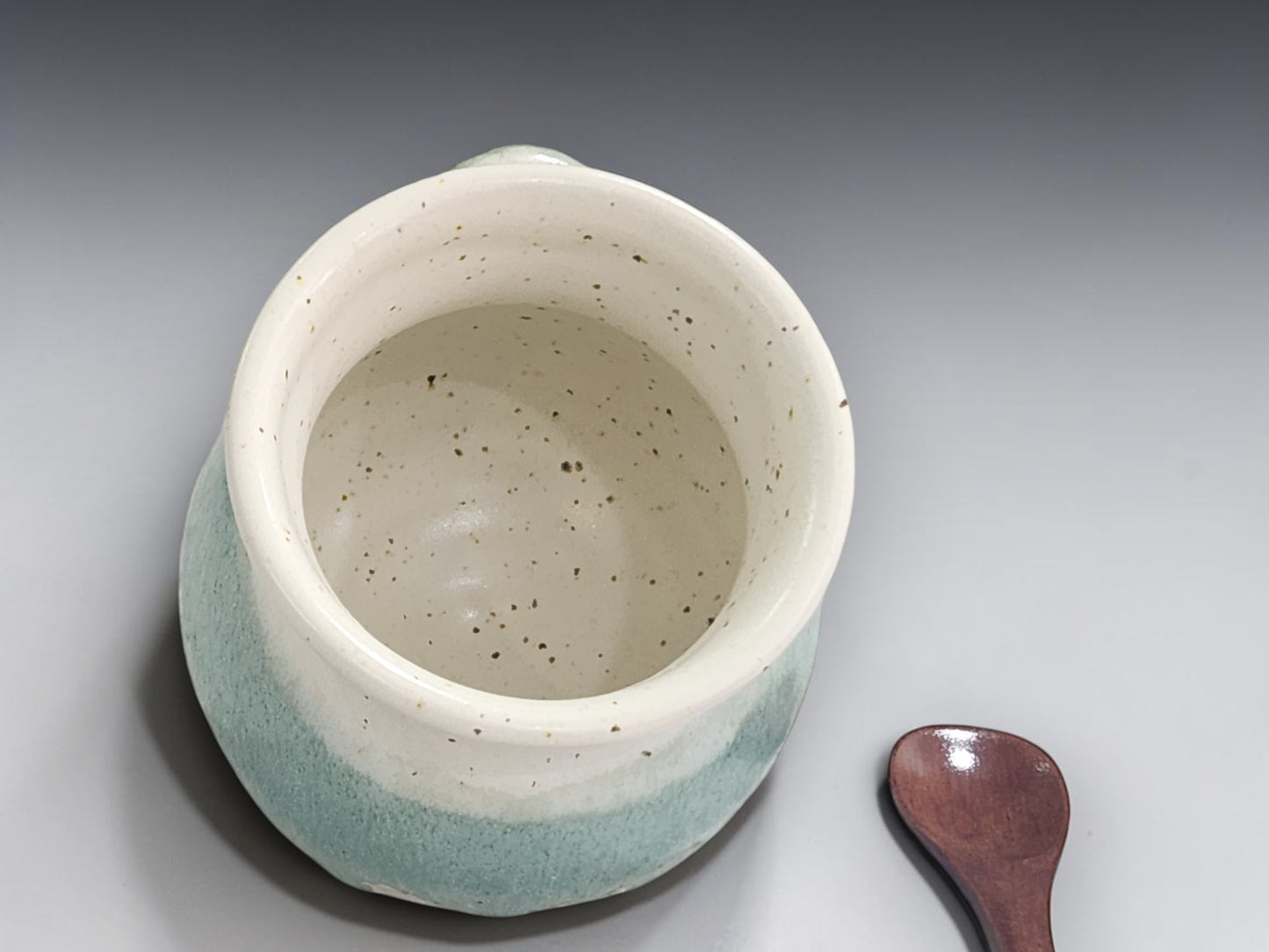 Small ceramic salt pig with speckled interior finish