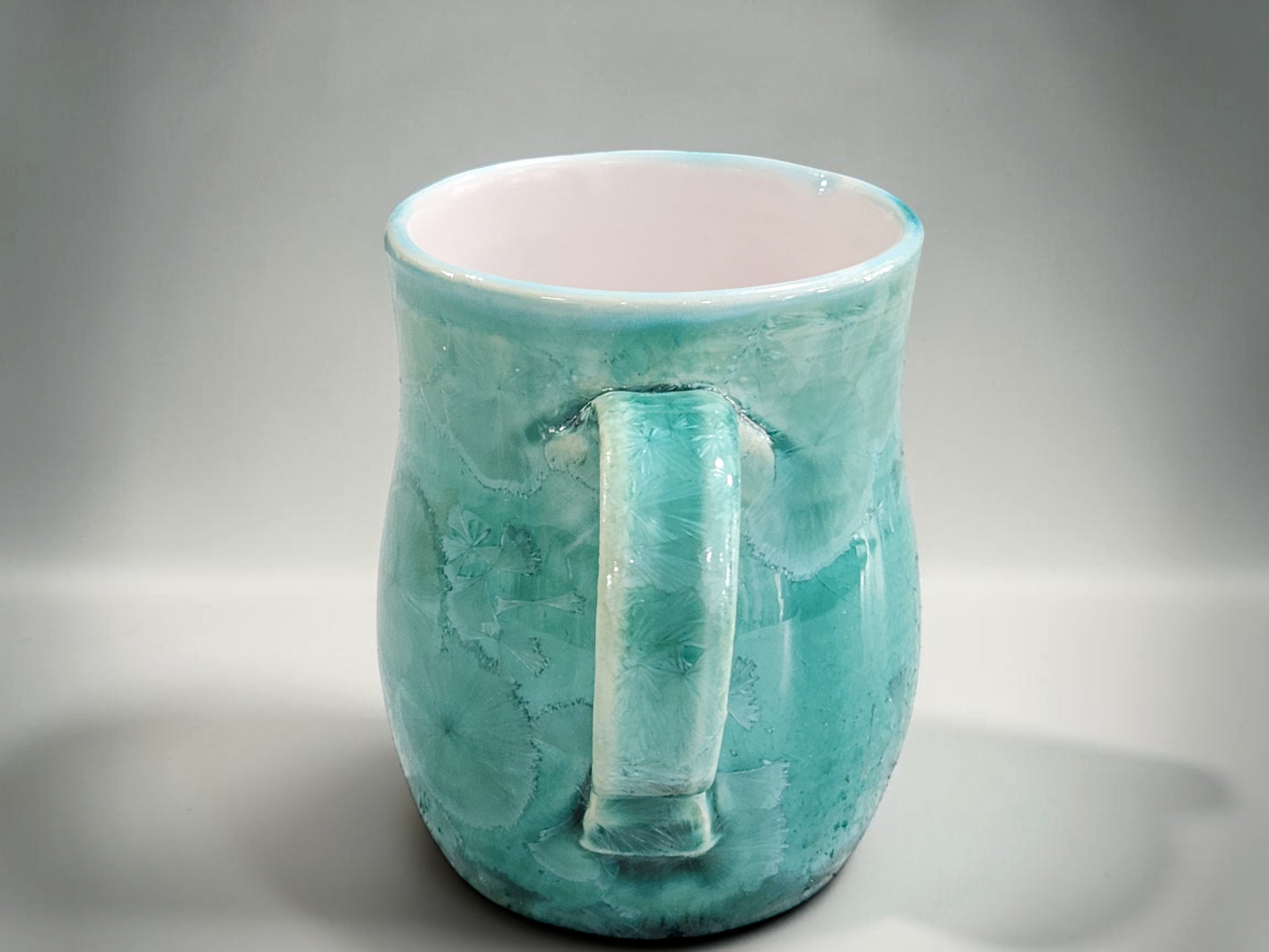 Green crystalline tea mug made from high-fired porcelain in Australia
