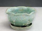 Soft green glazed berry bowl with scalloped rim