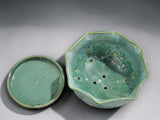 Ceramic berry bowl with matching plate in green glaze