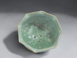 Unique green handmade colander bowl for fruit and berries

