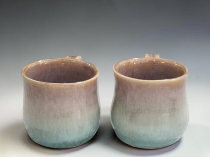 Wheel thrown ceramic mug with comfortable handle and organic mottled glaze finish by Buxton Pottery.