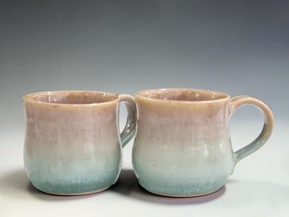 Artisan ceramic coffee cup crafted from stoneware clay and finished with unique layered glazing techniques