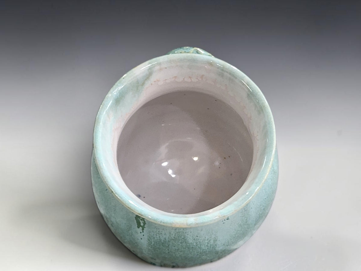 Ceramic salt cellar with wooden spoon for easy cooking access
