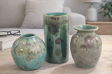 Display setting of Handmade green crystalline ceramic vase 17.5cm tall  with other crystalline pots from Buxton Pottery Melbourne Australia