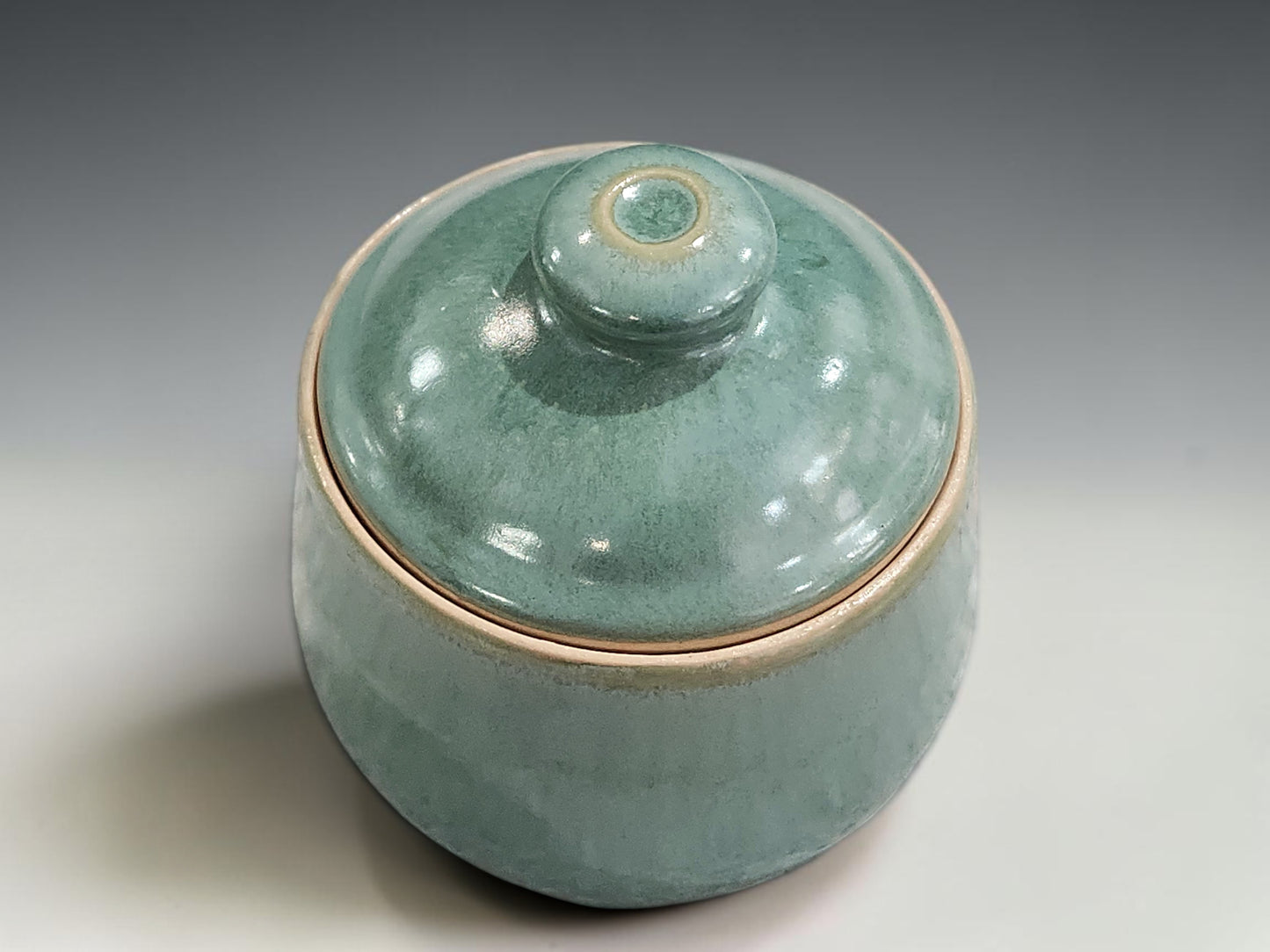Handmade stoneware sugar jar holding approximately two cups, ideal for tea and coffee