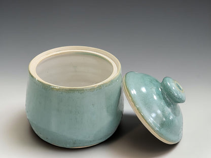 Handmade pottery lidded jar in seafoam green glaze for sugar, tea or small pantry storage