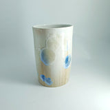 Porcelain vase with random crystal formations and glossy finish
