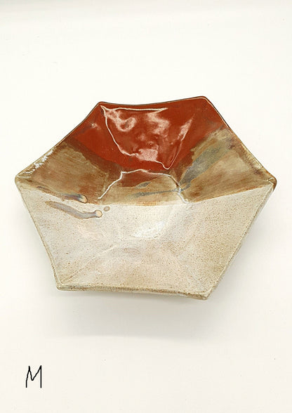 High-fired speckled stoneware bowl with warm natural glaze