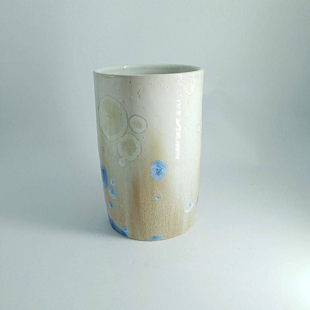 Ombre cream-to-tan ceramic vase with floating crystals