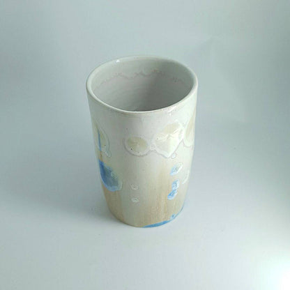 Top view of Blue crystal detail on tall handmade pottery vessel