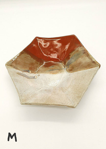 Limited edition pottery bowl with layered cream and brown glaze
