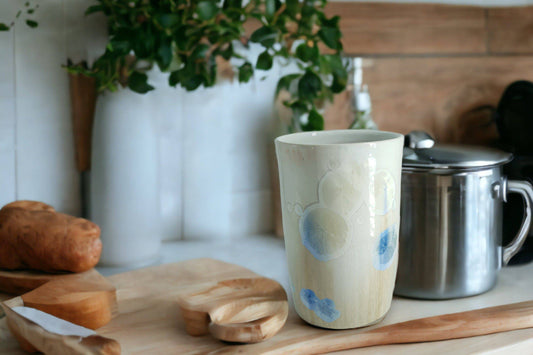 Handmade porcelain vessel with blue crystalline glaze