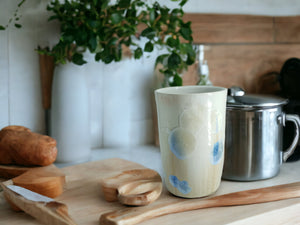 Handmade porcelain vessel with blue crystalline glaze