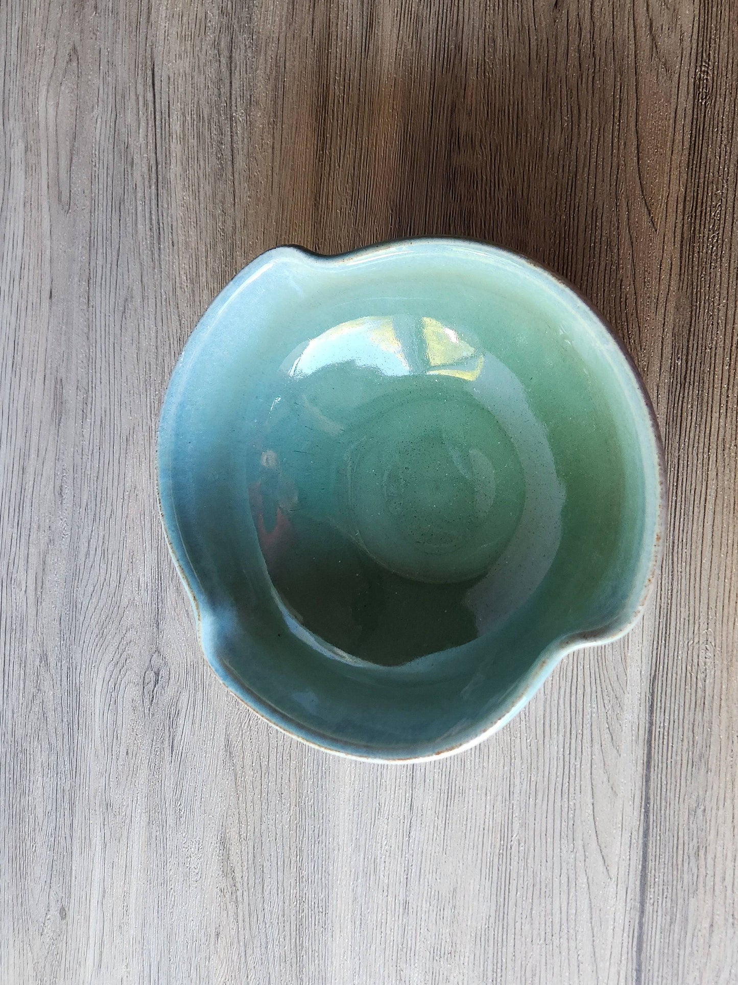Handmade pottery bowl with natural glaze finish